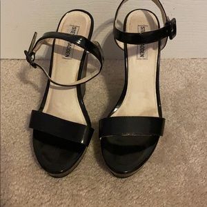 Black patent leather wedges